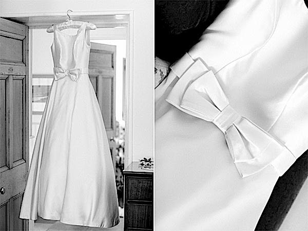 white wedding dress hanging 
