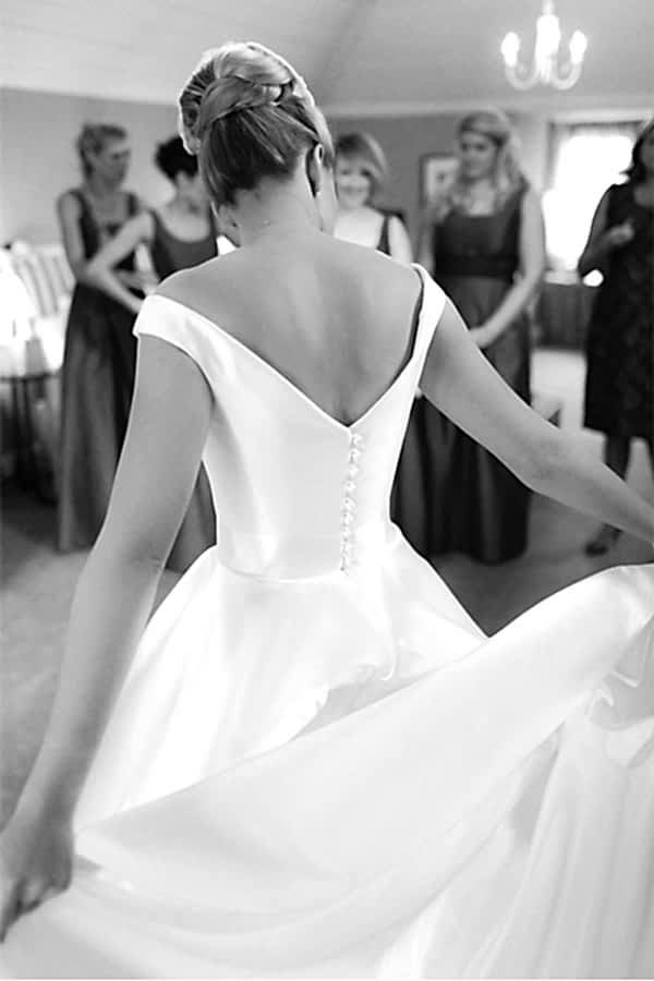 bride spreading her dress