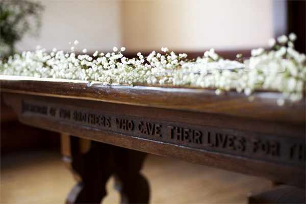 flowers and wedding detail inside church 
