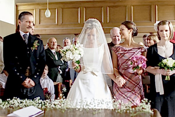 bride walking down the aisle in scottish church