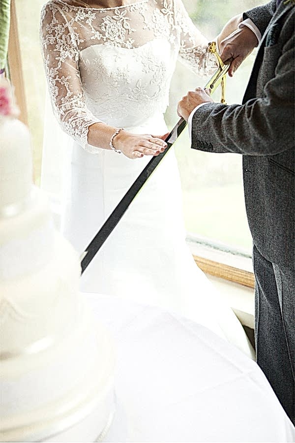 cutting of teh cake wedding at stonefield castle