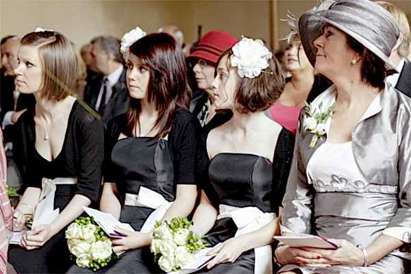 bridesmates and mother at church during wedding