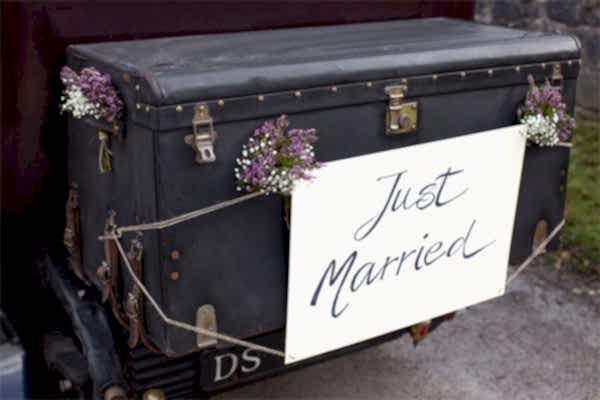 vintage car with sign just married