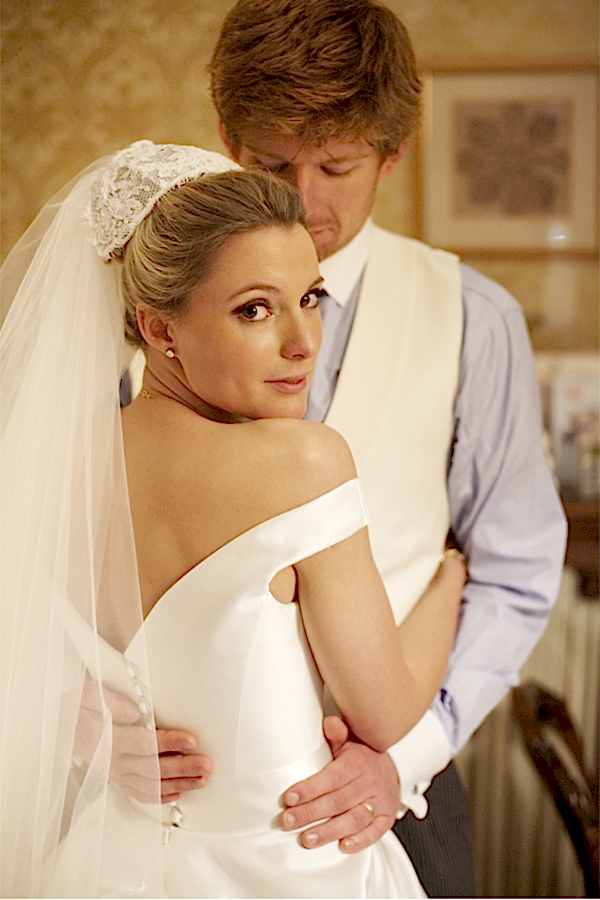 bride and groom holding each other wedding photos glasgow