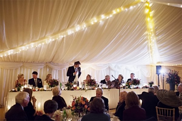 groom in speaking during wedding speeches