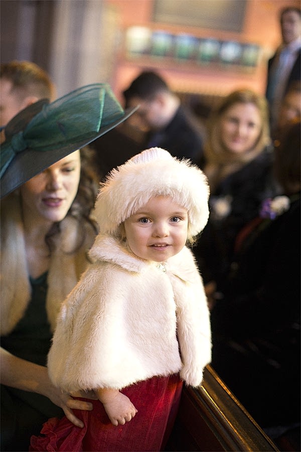 little girl in christmas outfit on a wedding in scotland 