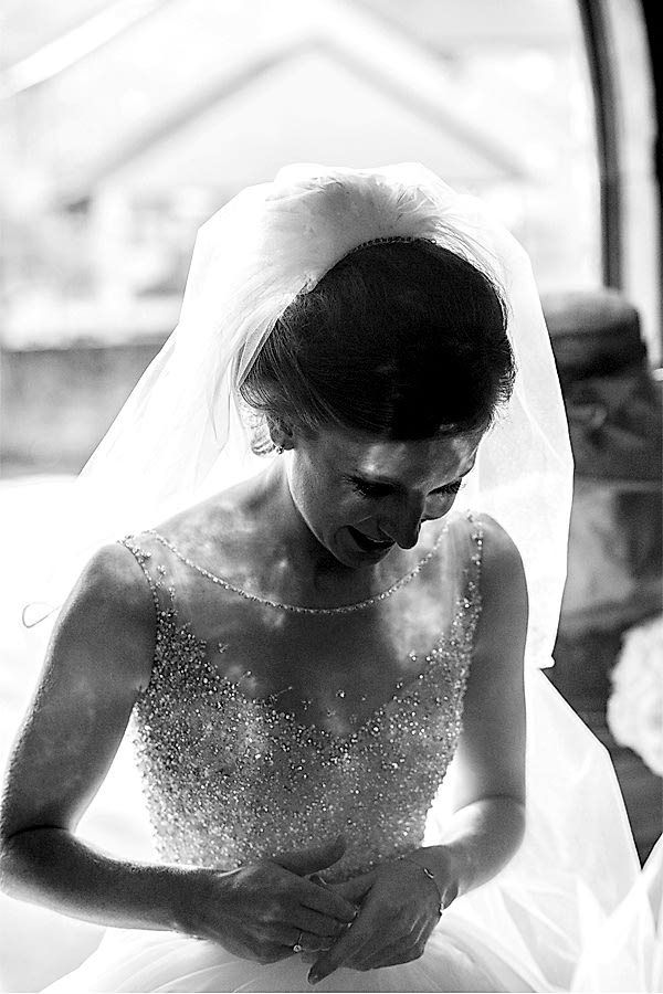 bride with sun reflexions on her face