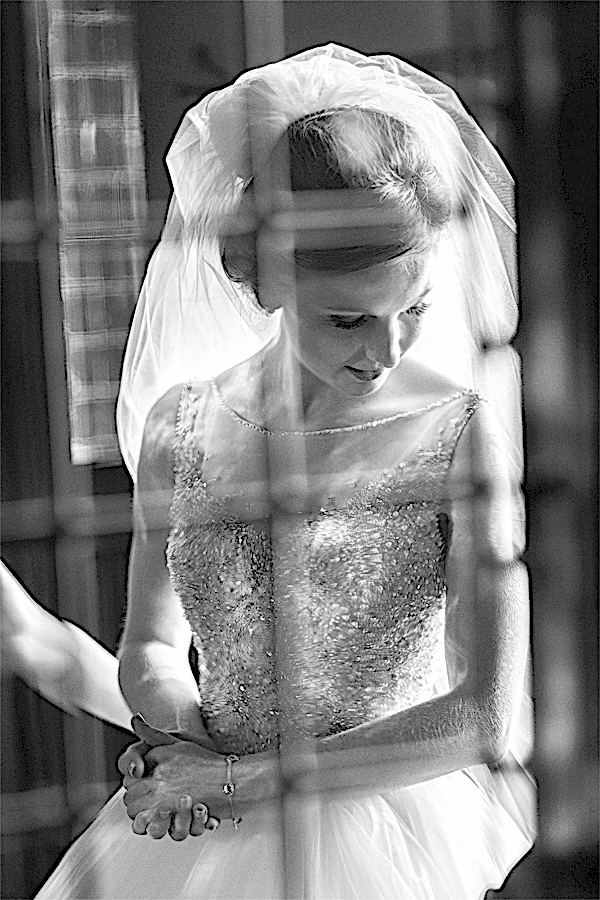 bride looking back at her dress