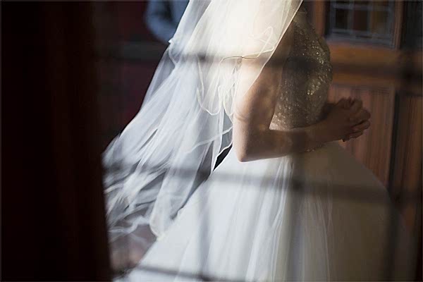 bride walking slowly into the church
