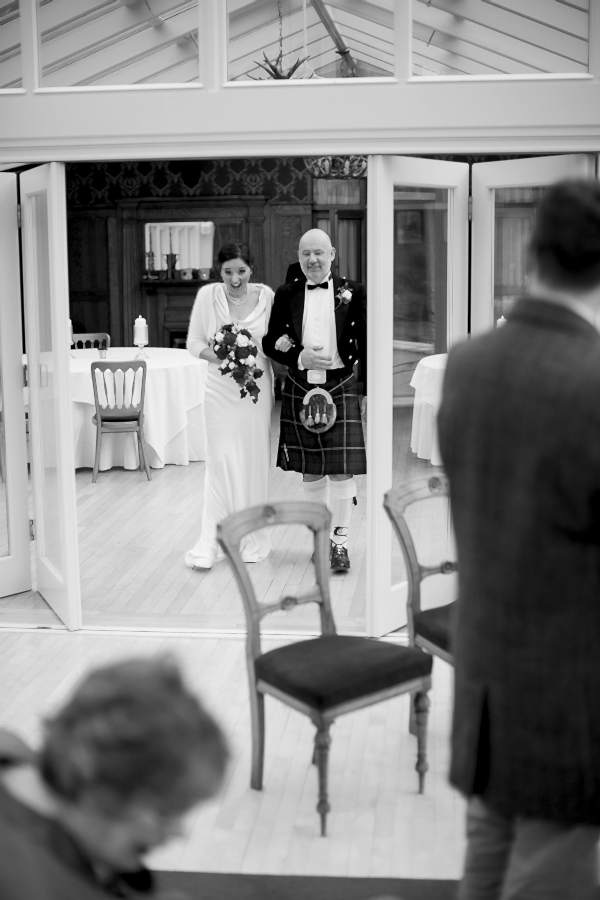 bride walking down the aisle at wedding 
