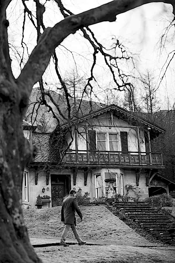groom walking to main house
