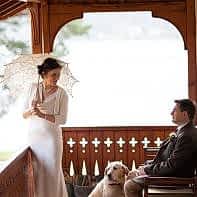 bride and groom with dog and umbrella elopement at the lodge on loch goil