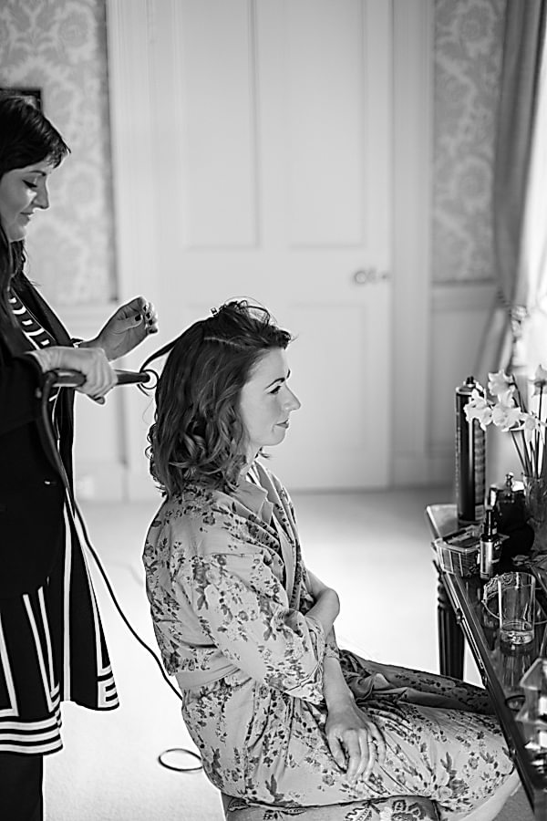 bride having her hair done at blairquhan castle