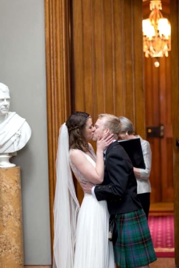first kiss during wedding ceremony