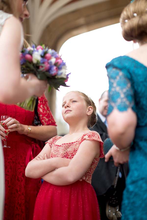 girl looking at bride reportage photographer glasgow
