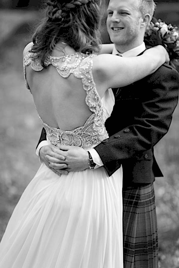 bride and groom embraced wedding session at Blairquhan Castle