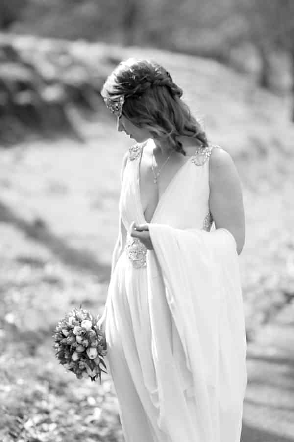 wedding photography packages glasgow bride looking down on the flowers fotogenic of scotland