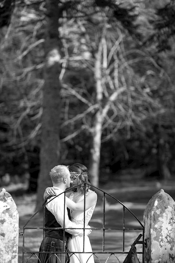 bride and groom embraced