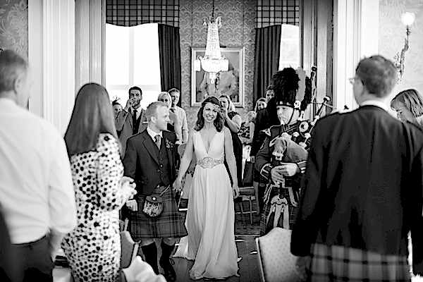married couple piped in at Blairquhan Castle