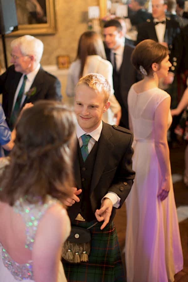 groom dancing with bride