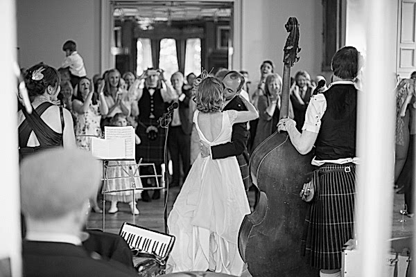 groom lifting bride at Oxenfoord Castle Wedding