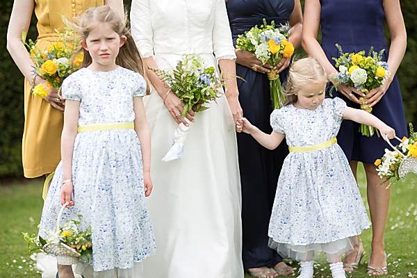 bride with briesmates and flower grils