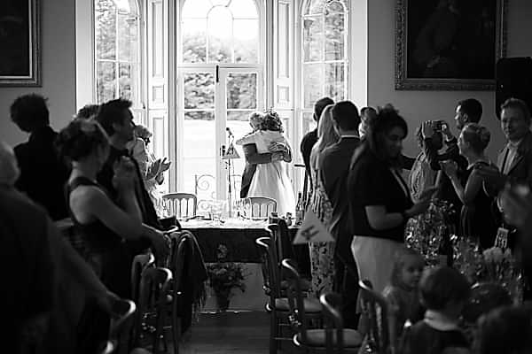 bride huging father at oxenford reception near edinburgh