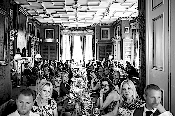 wedding guests at main hall oxenford castle