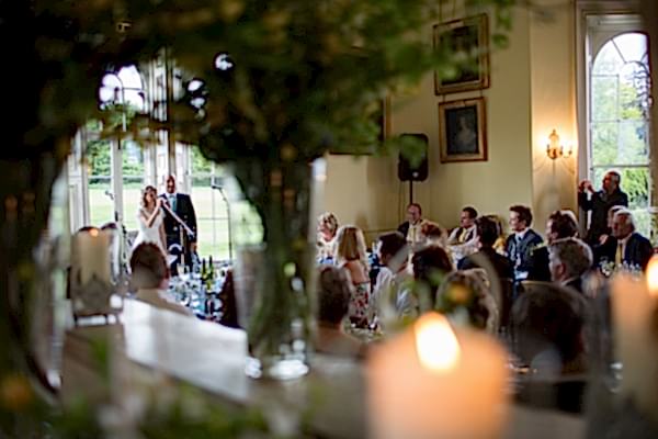 bride and groom doing a wedding speech at oxenford castle