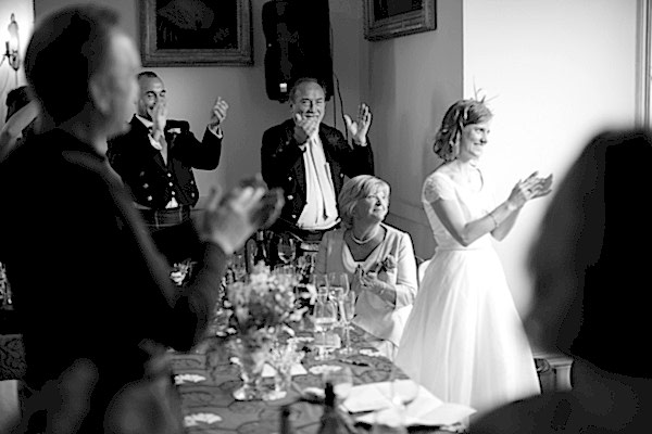 bridal party clapping during speeches
