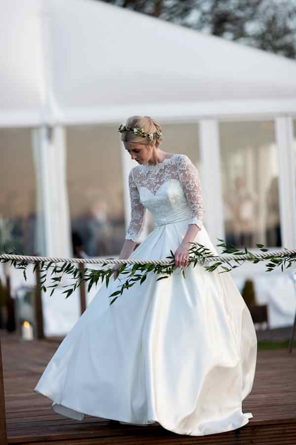 bride with flowers in her hair in the evening