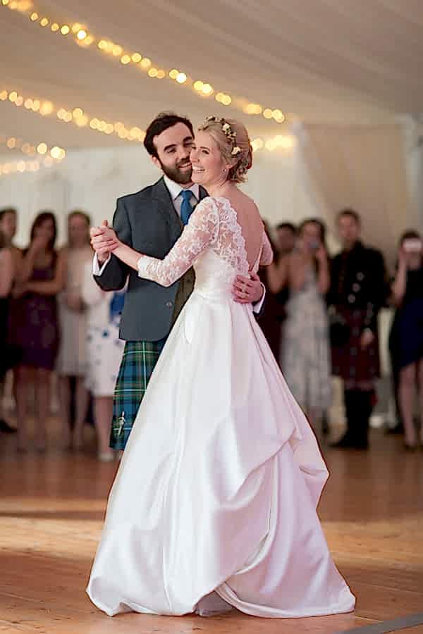 first dance, bride and groom embraced