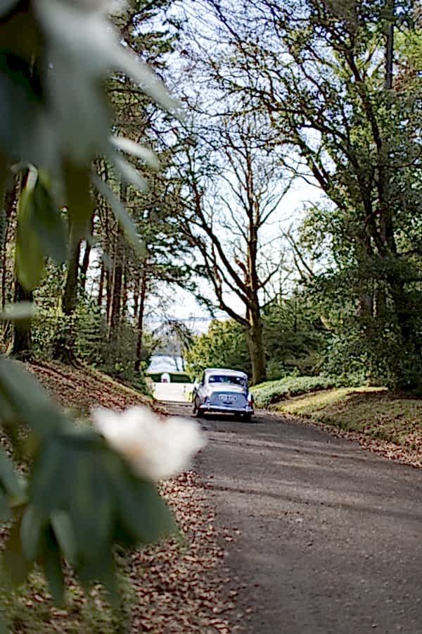 wedding car driving to boturich castle 
