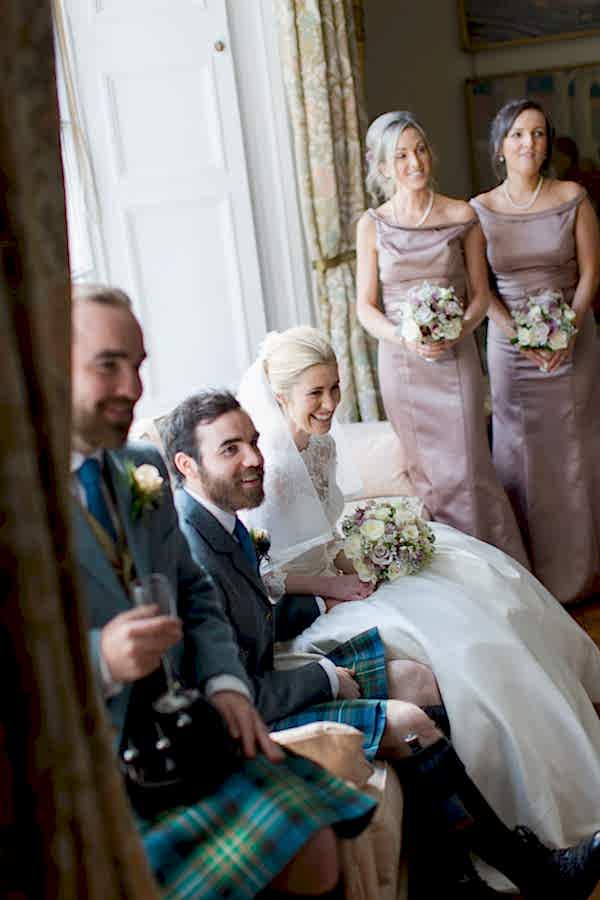 bridal party laughing at boturich castle wedding