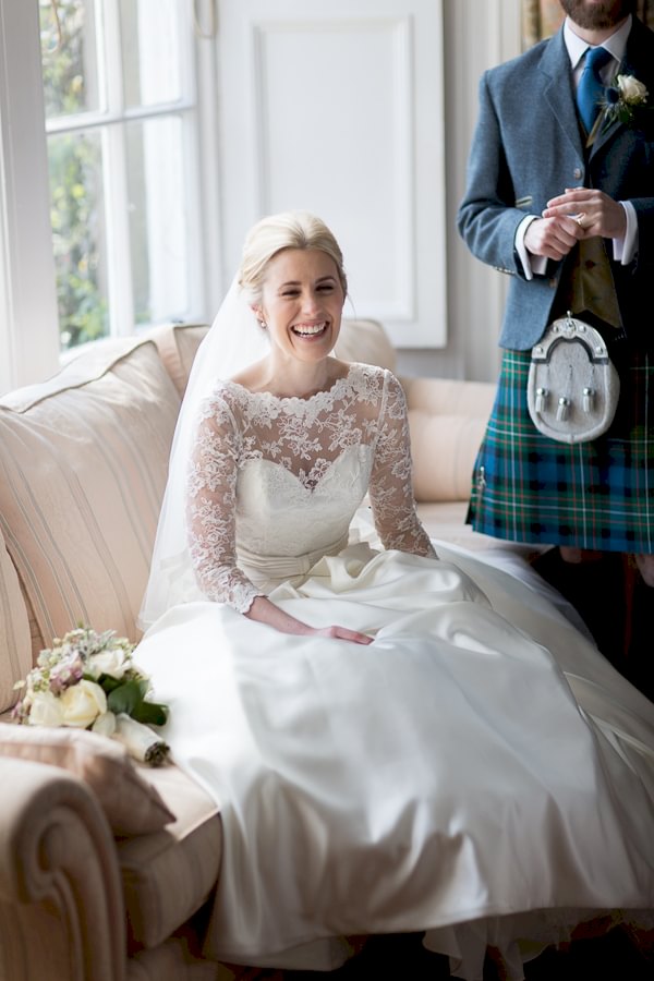 bride laughing inside the boturich castle 