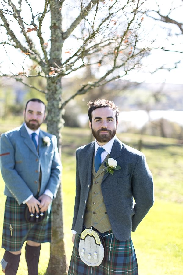 groom with his best man with loch lomond in the background