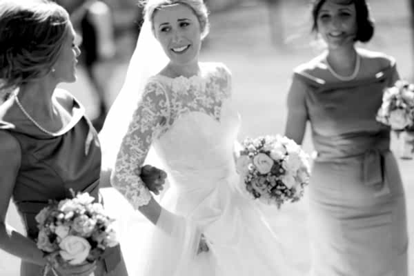 bride walking with bridesmates