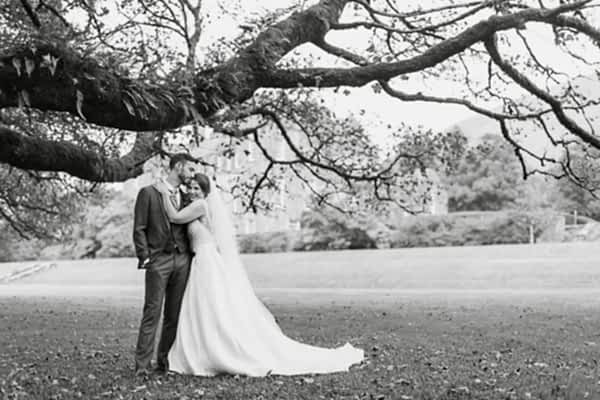 wedding photography glasgow prices married couple embraced