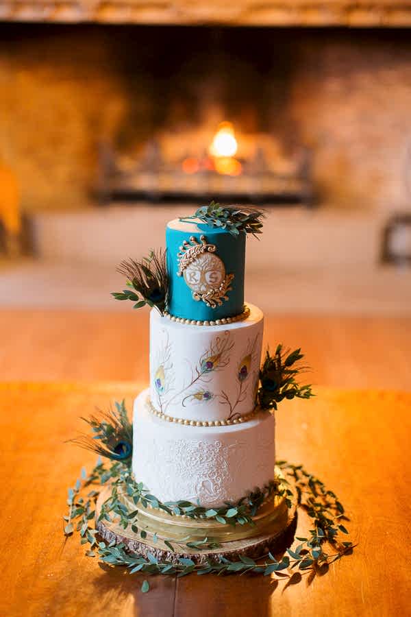 impressive wedding cake at main hall in scottish wedding venue ardkinglas