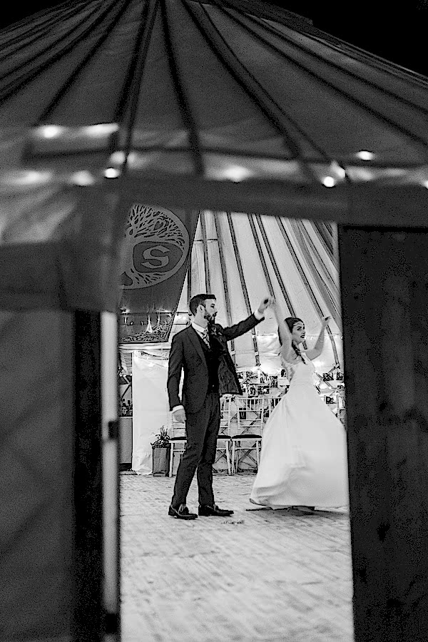 bride and groom practising before the furst dance at tipi tent