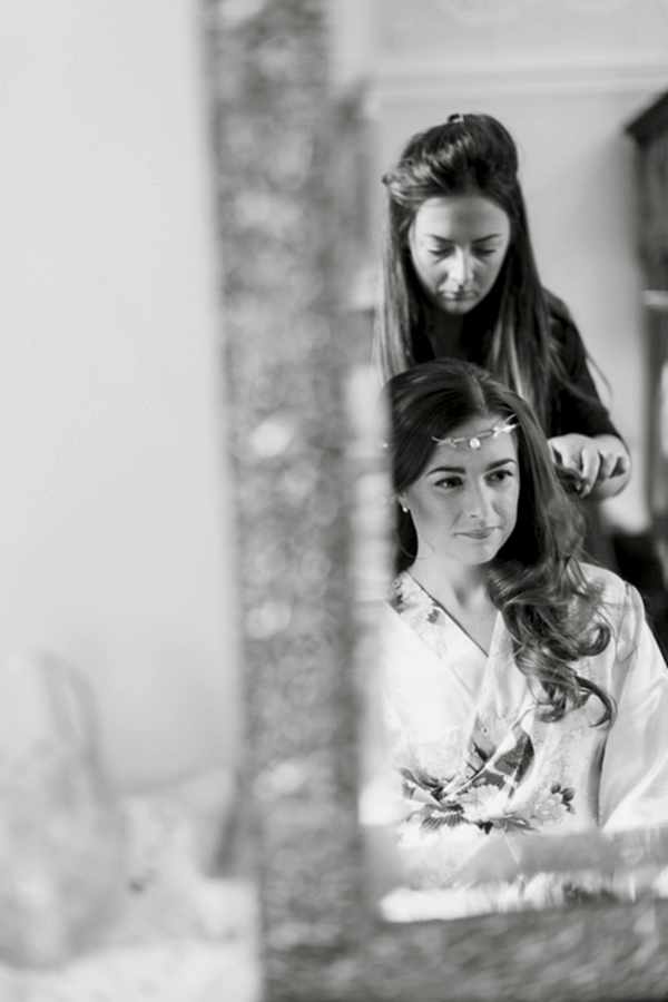 bride having her hair done at ardkinglas wedding venue near glasgow in scotland