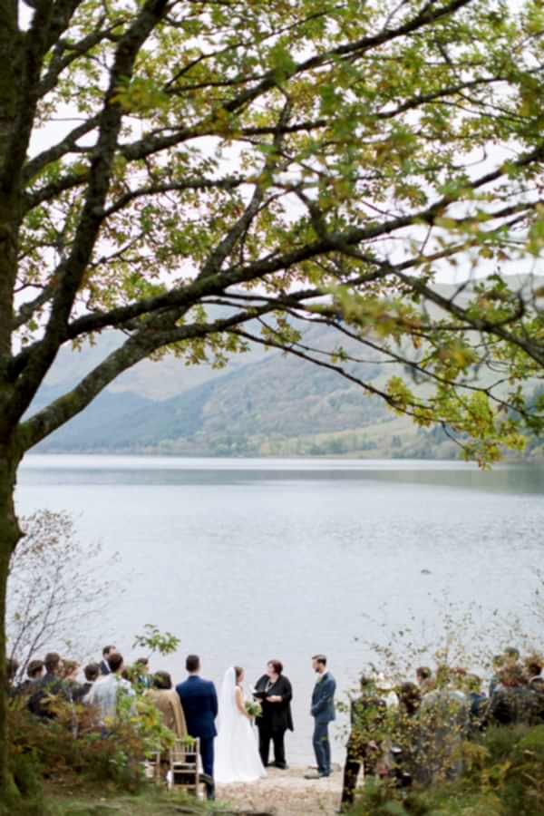lovely outdoors ceremony at loch eck with view