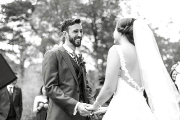 groom looking at bride with love 