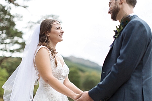 bride looking at groom during ceremony