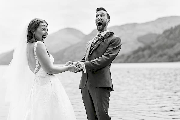 bride and groom excited about to kiss