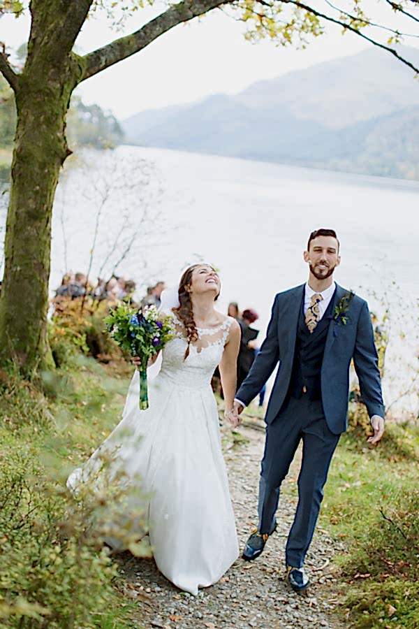 bride and groom just married walking