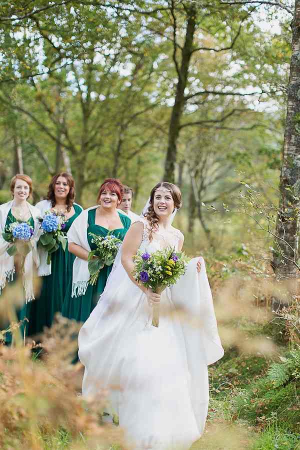 bride with bridesmates smiling