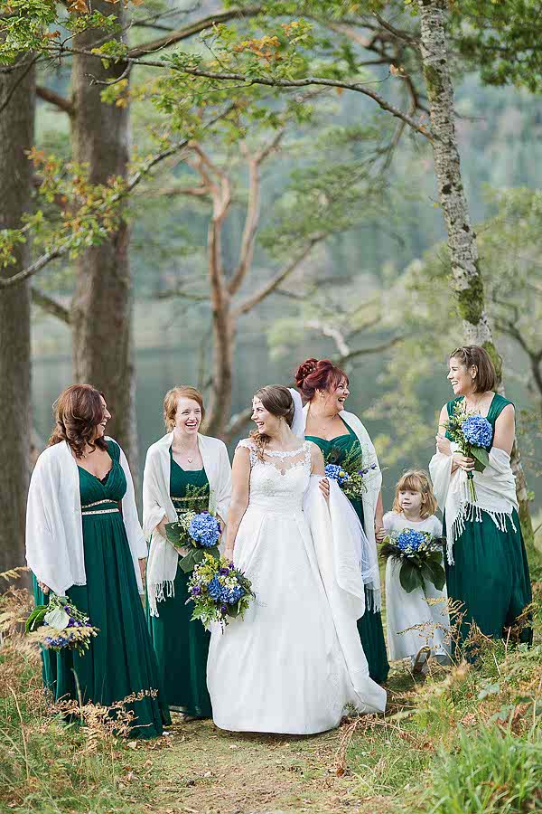 bride with bridesmates and flowergirl