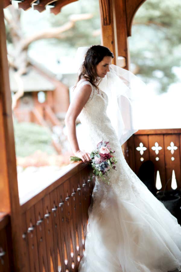 bride with wet hair from rain at loch goil