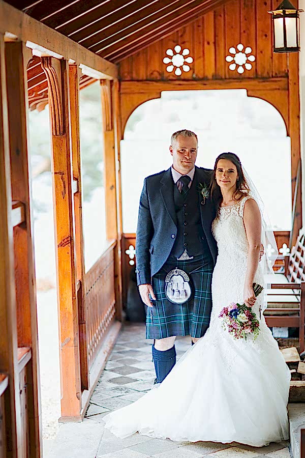 bride and groom standing together